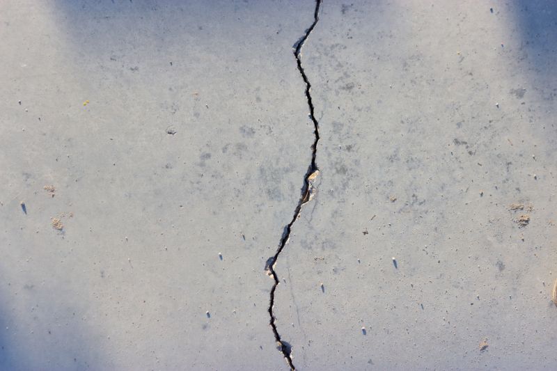 What Causes Concrete Cracks, Spalling, And Surface Damage